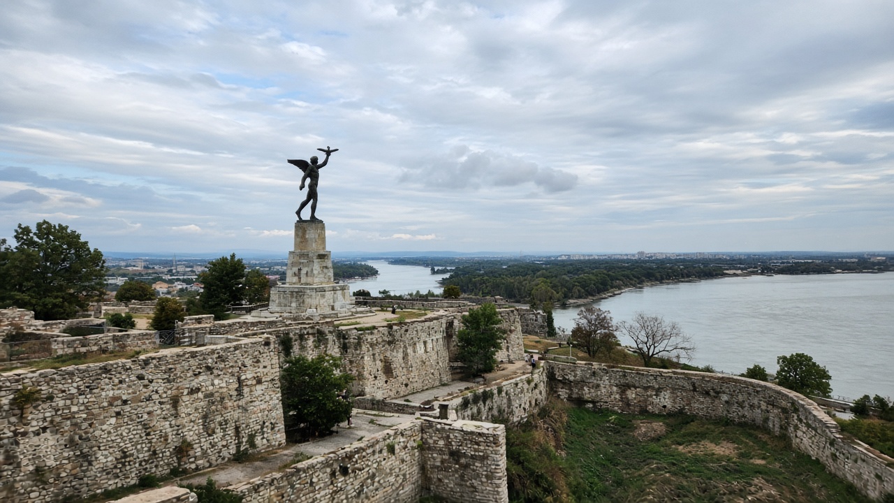 Tourist smartphone photo of the Victor (Pobednik) monument at Kalemegdan Fortress with Sava and Danube rivers below