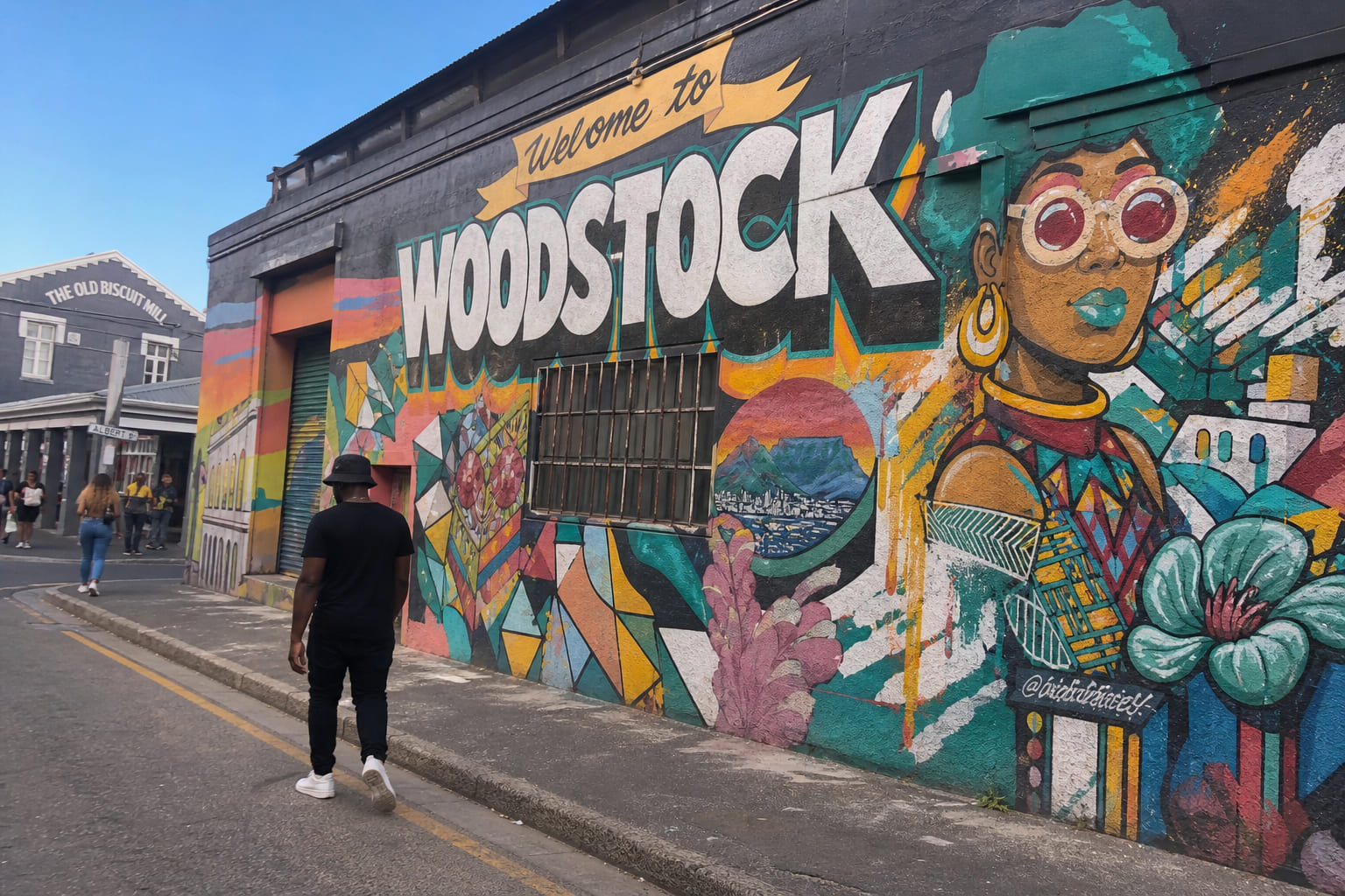 Colorful street mural on a warehouse wall in Woodstock, Cape Town — casual smartphone tourist photo