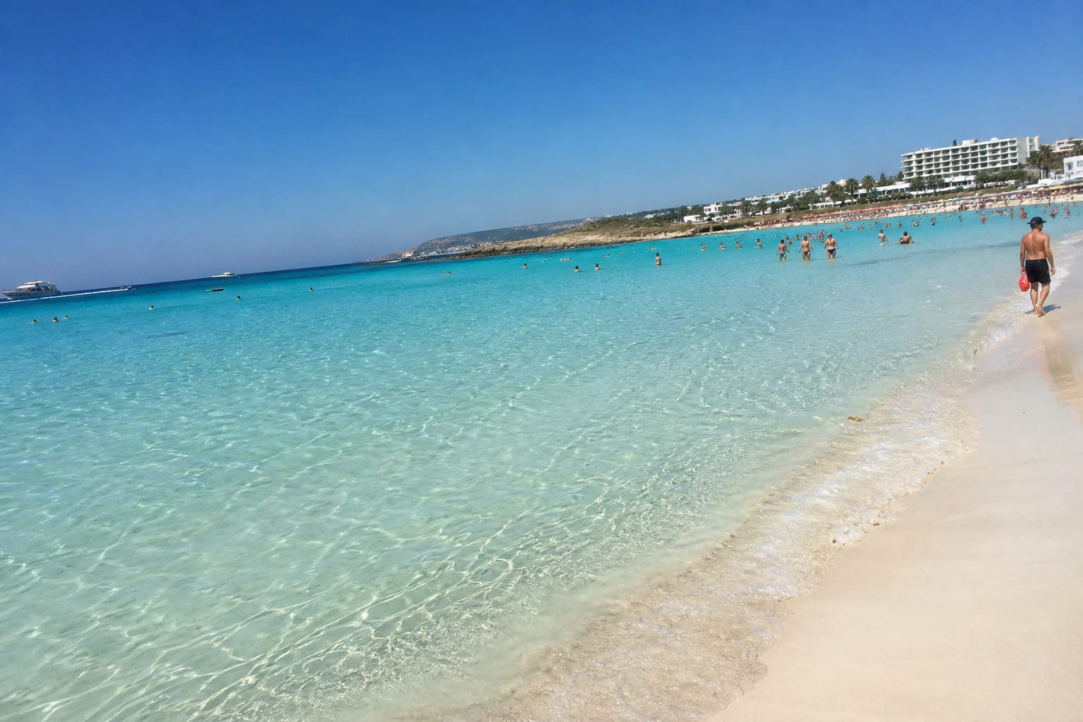 White sand and turquoise water at an east Cyprus beach — casual smartphone travel photo