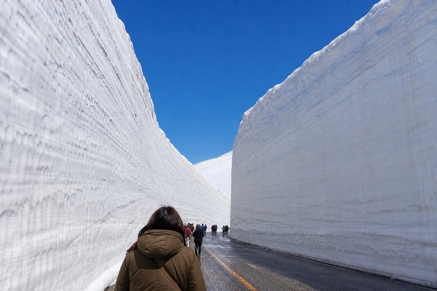 Tateyama Kurobe Alpine Route: Yuki-no-Otani snow corridor Tateyama Kurobe snow corridor — casual smartphone travel photo with towering white snow walls