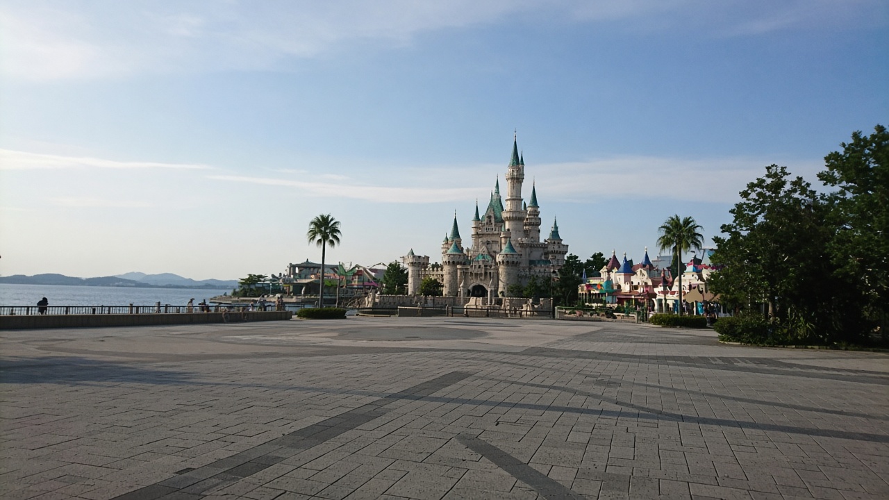 Universal Studios Japan plaza looking toward a themed castle, shot on a tourist phone