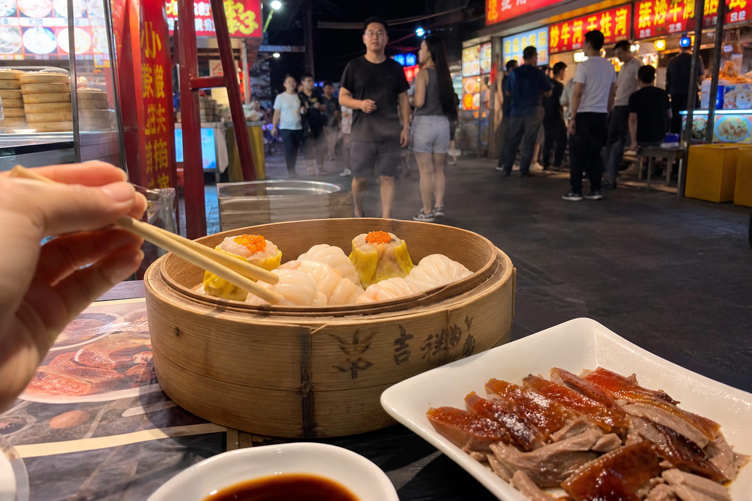 Tourist phone photo of dim sum and Peking duck at a night market in China