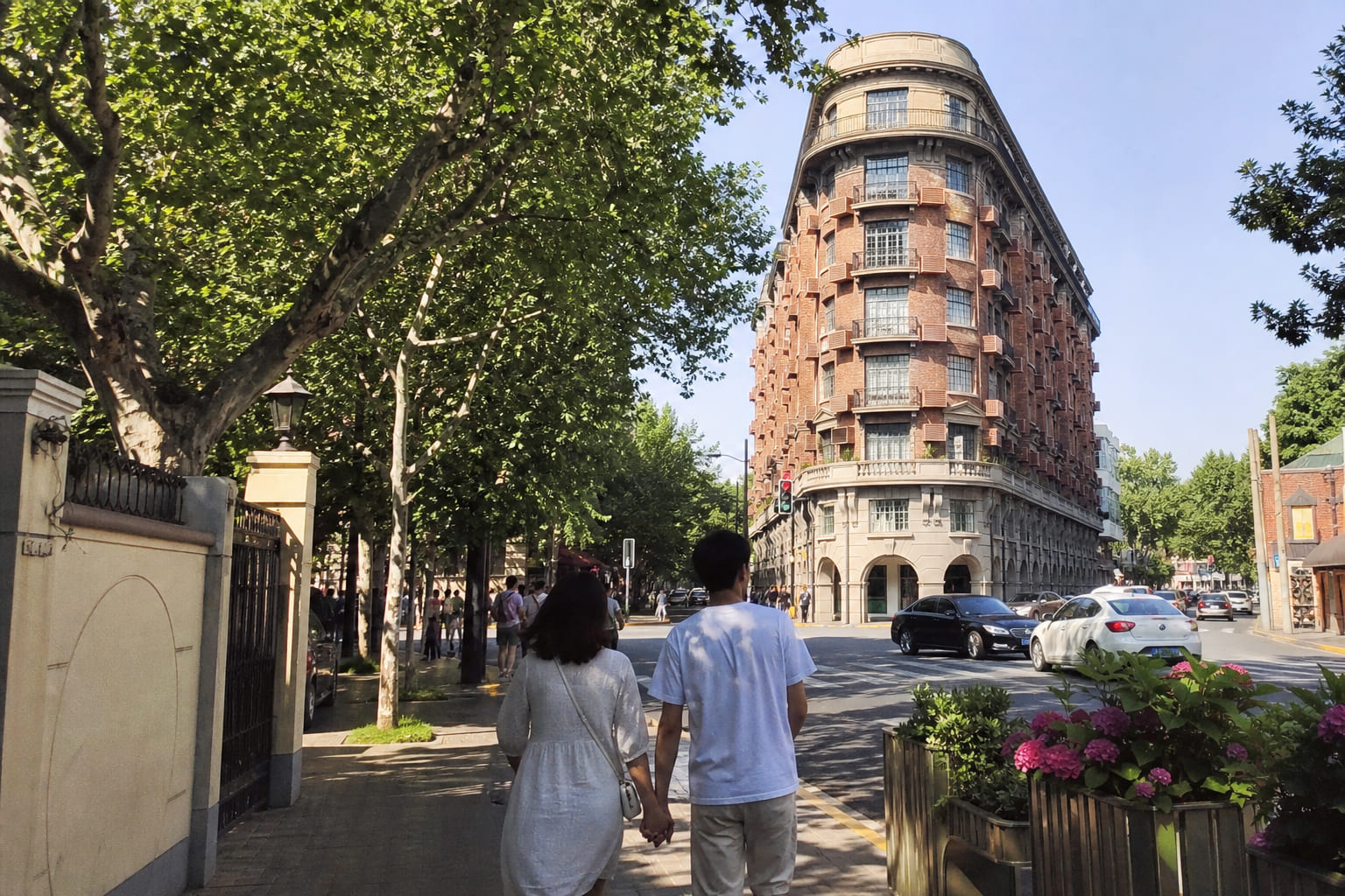 Wukang Road in Shanghai French Concession — tourist smartphone photo under plane trees